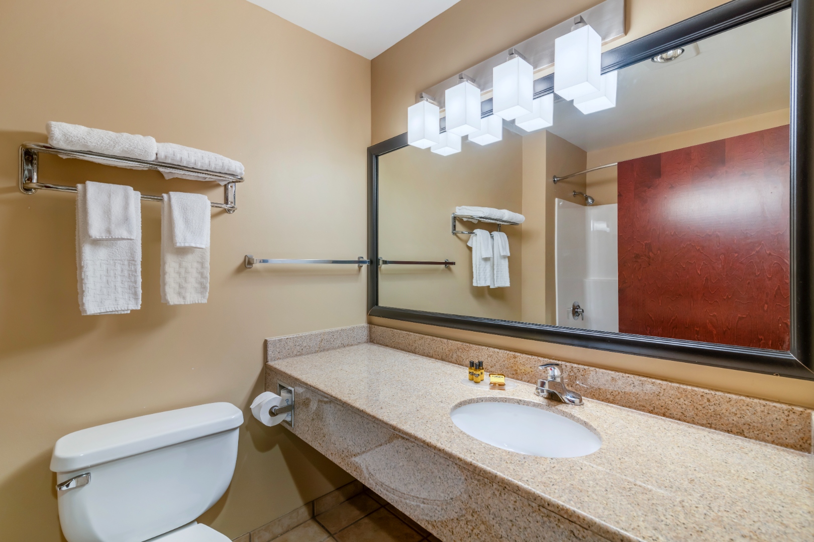 Modern guest bathroom at Syracuse Grand hotel